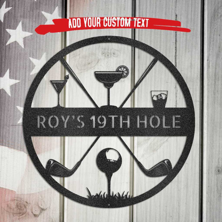 Black metal "ROY'S 19TH HOLE" monogram with golf clubs, ball, and cocktails on a rustic wood background.