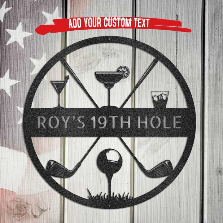 Black metal "ROY'S 19TH HOLE" monogram with golf clubs, ball, and cocktails on a rustic wood background.