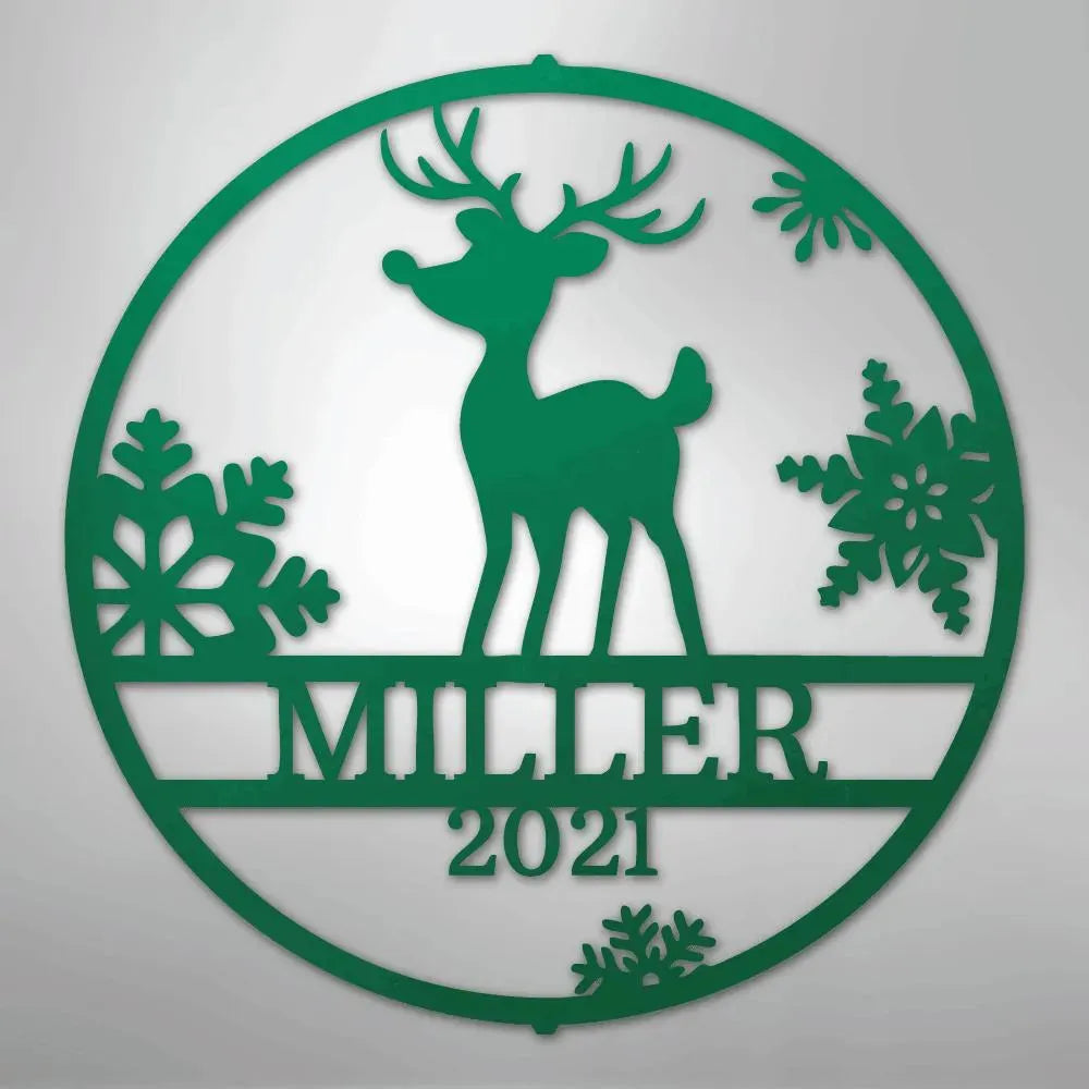 Green metal wall art featuring a reindeer, snowflakes, and "MILLER 2021" text within a circular design.