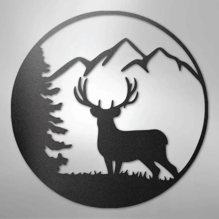 Black metal wall art featuring a graceful deer, pine tree, and mountains within a circular design.