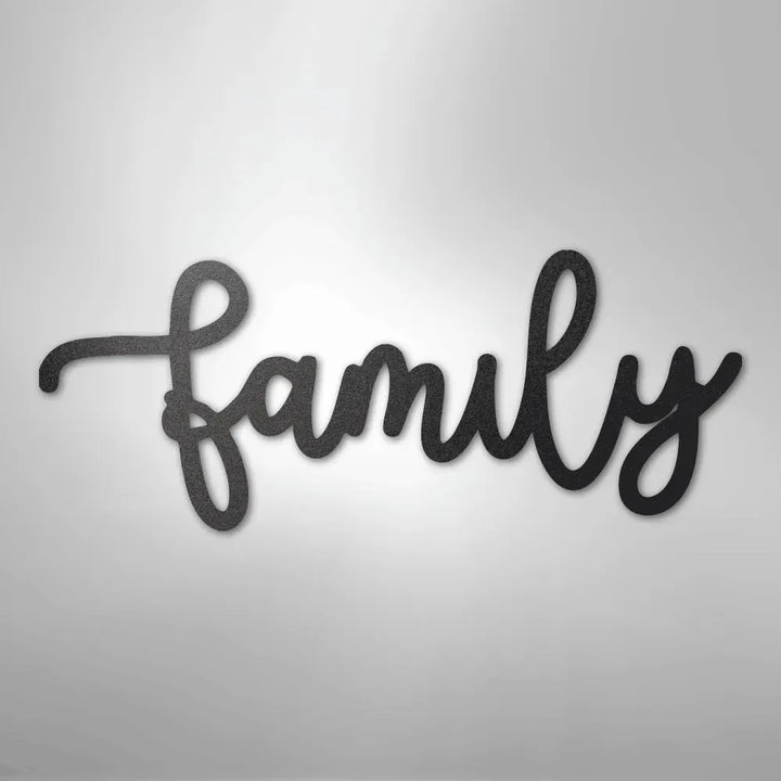 Black metal "family" script wall art in a flowing cursive font.