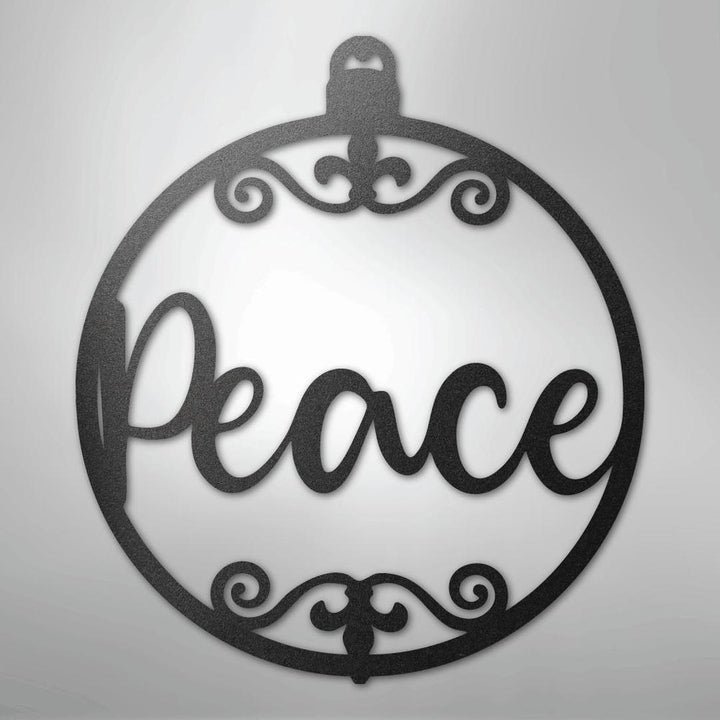 Black powder-coated steel Christmas ornament wall art with "Peace" in script and decorative scrolls.