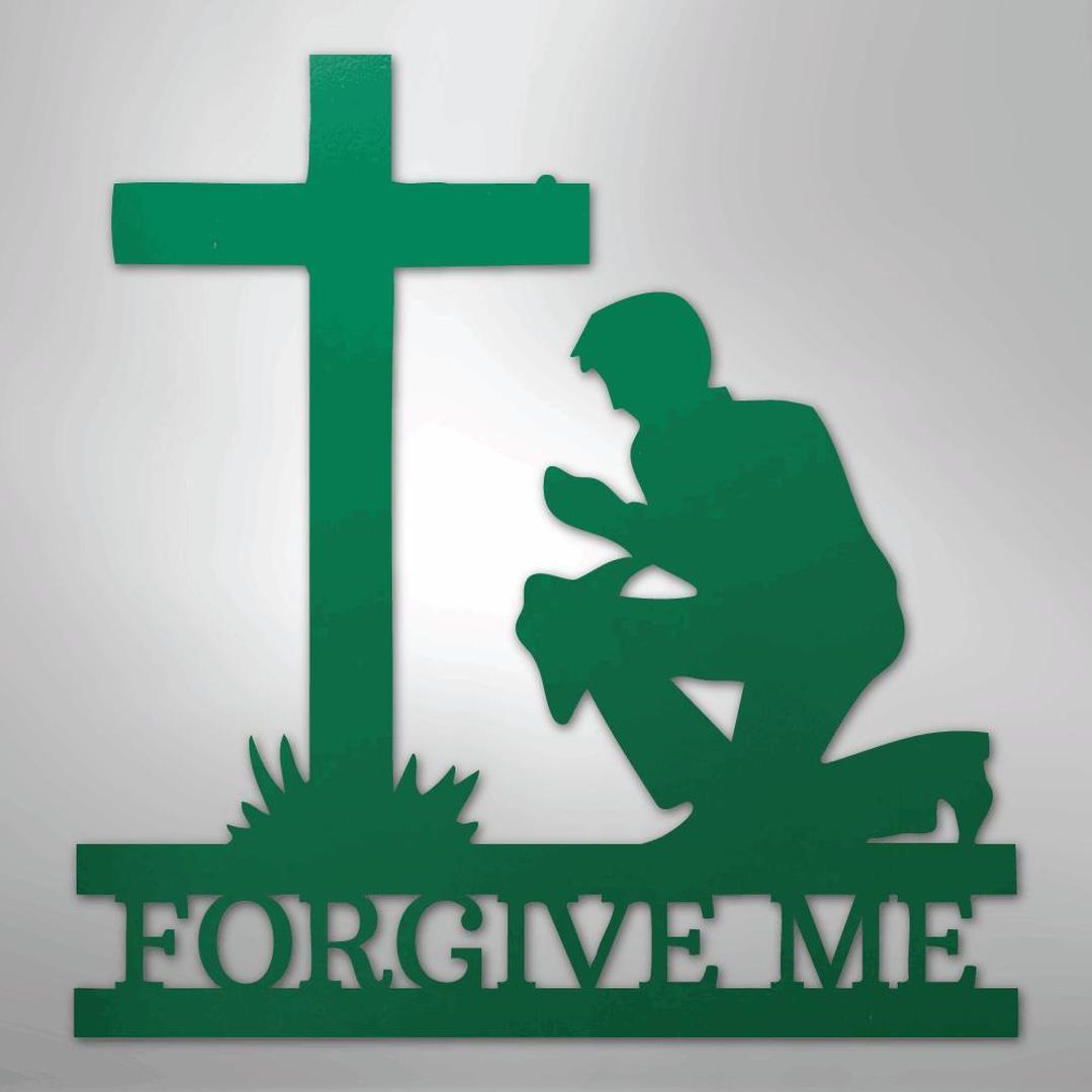 Green metal wall art depicting a kneeling man praying before a cross, with "FORGIVE ME" cut out below.