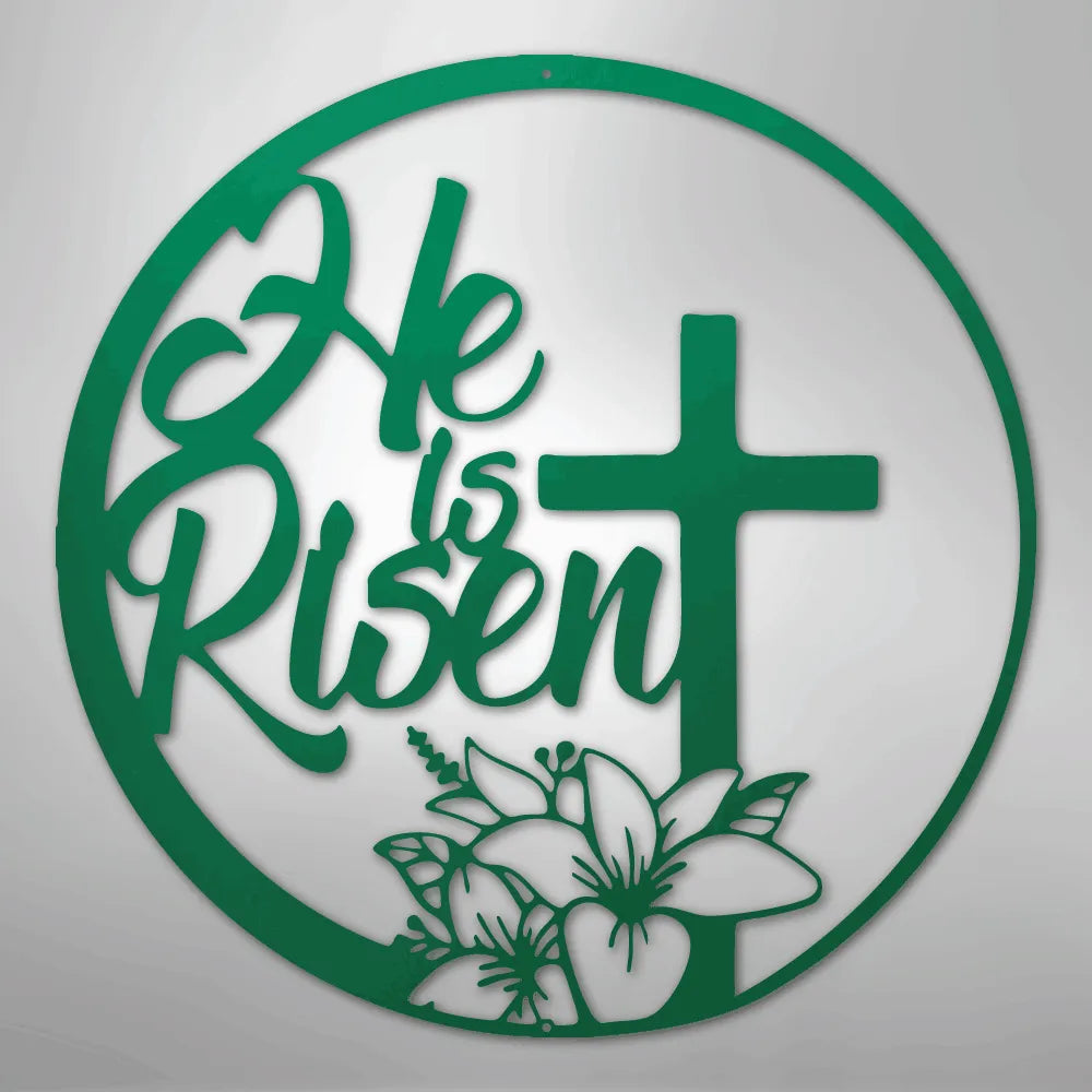 Green "He is Risen" metal wall art with a cross and lilies in a circular design.