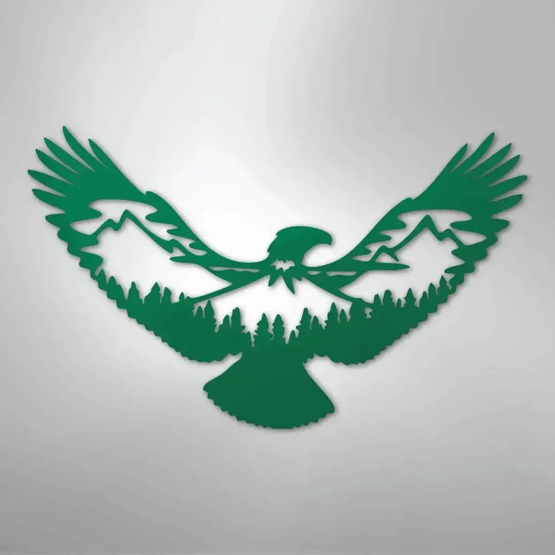 Green metal wall art featuring an eagle silhouette with mountains and pine trees within its wings.