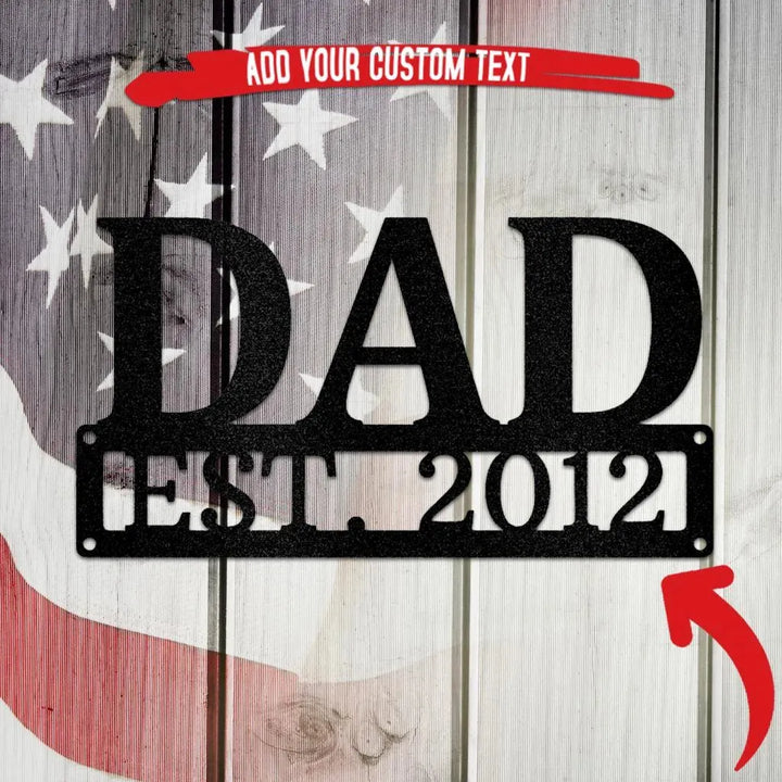 Black metal "DAD EST. 2012" wall art on a distressed American flag background.