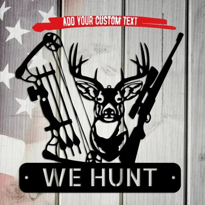 Black metal deer hunter monogram with a buck, bow, arrows, rifle, and "WE HUNT" text on a rustic American flag background.