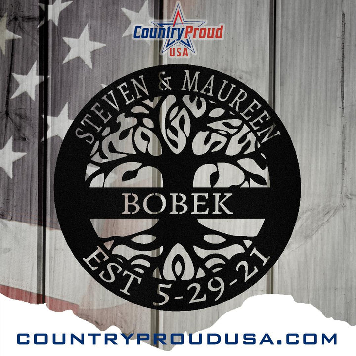 Black metal Tree of Life wall art with custom names and date, set against a rustic American flag.