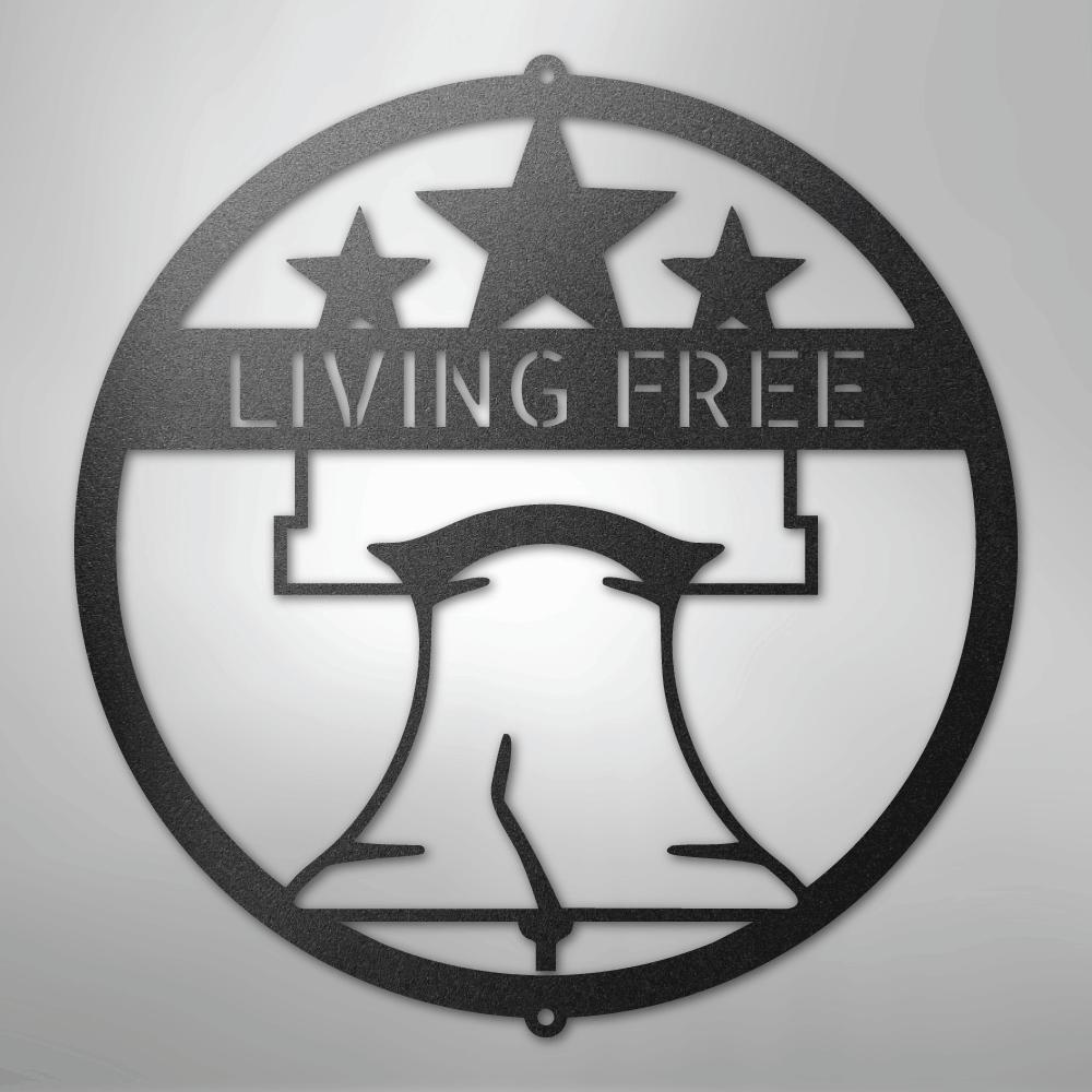Black metal Liberty Bell monogram wall art with "LIVING FREE" text and three stars.