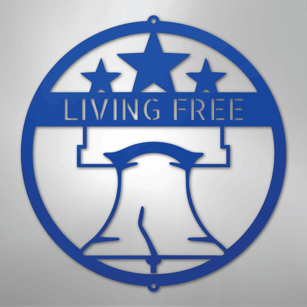 Blue metal Liberty Bell monogram wall art with "LIVING FREE" text and three stars.