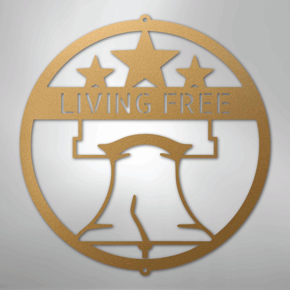 Gold metal wall art featuring a circular design with a Liberty Bell, three stars, and "LIVING FREE.