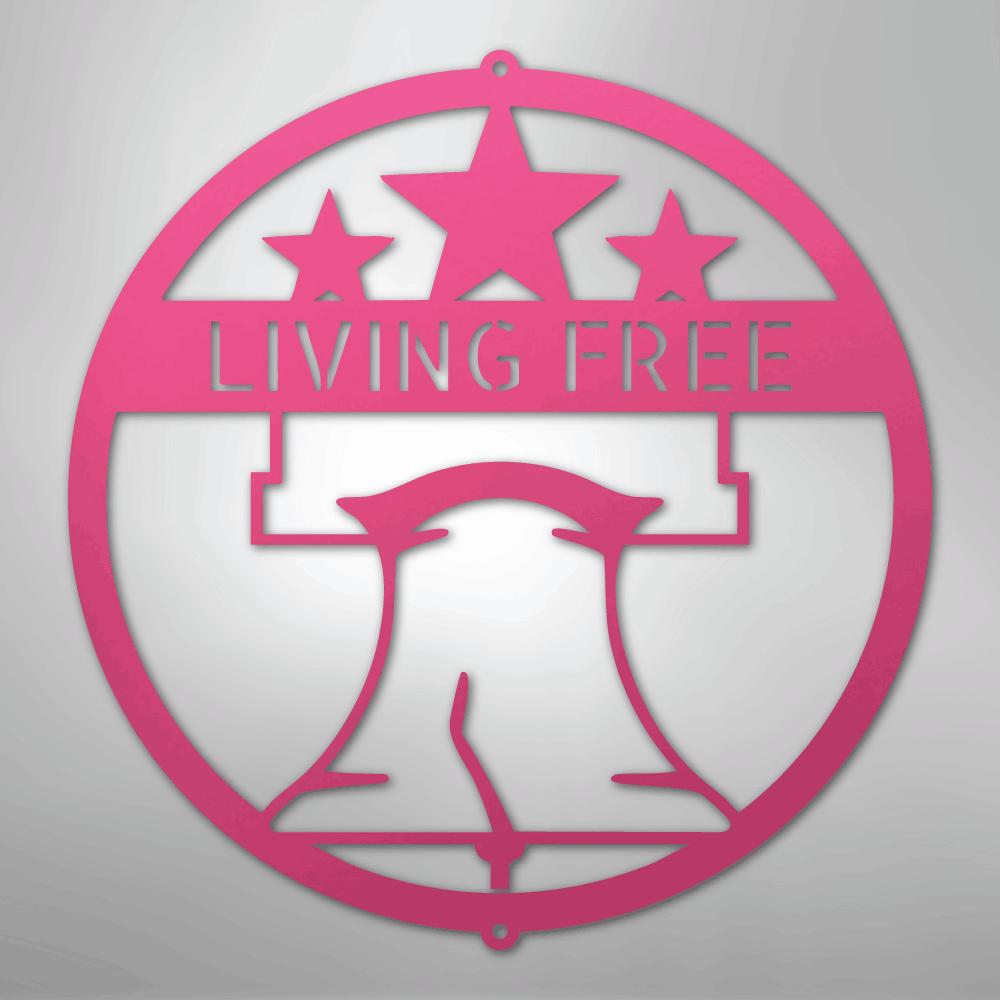 Pink metal Liberty Bell monogram wall art with "LIVING FREE" and three stars.