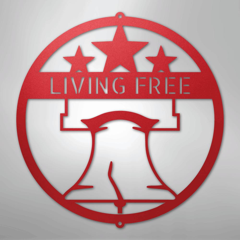 Red metal Liberty Bell monogram wall art with "LIVING FREE" text and three stars.