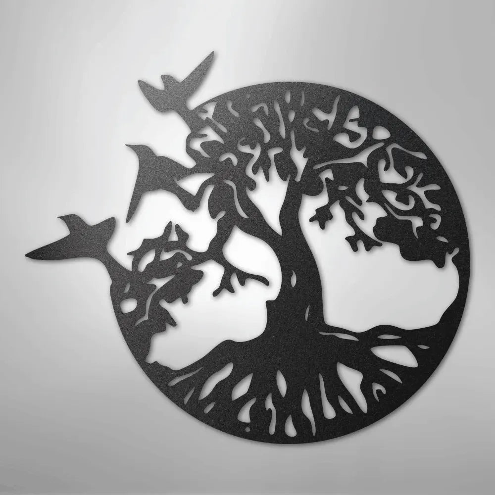 Black metal wall art depicting a tree of life with roots and branches, encircled, with three birds flying.