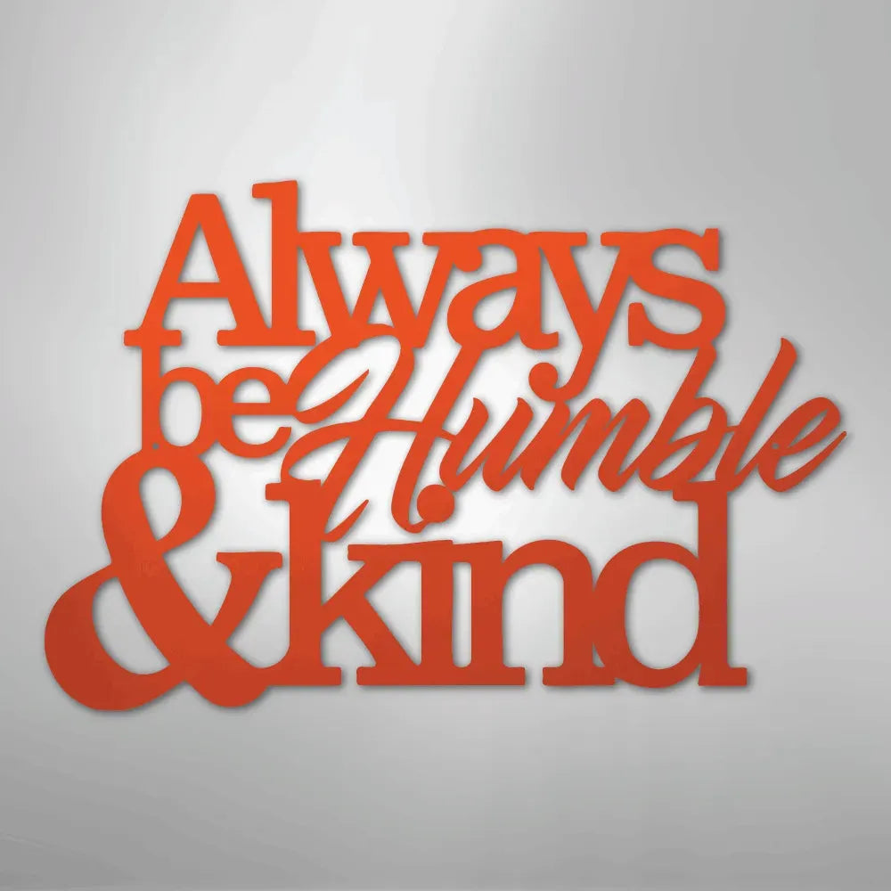 Orange powder-coated metal wall art with "Always be Humble & Kind" in varied fonts.