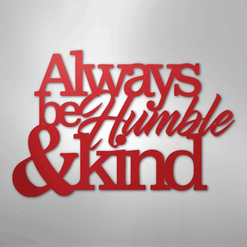 Red metal wall art decor with "Always be Humble & Kind" in a mix of script and block fonts.
