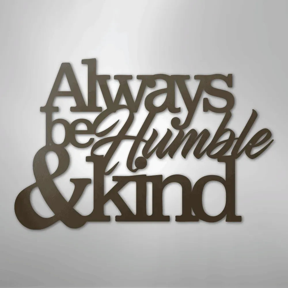 Brown metal wall art with "Always be Humble & Kind" in varied fonts.