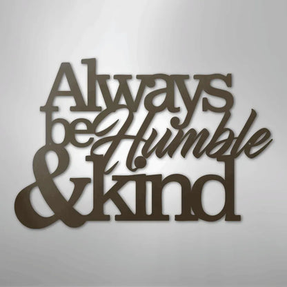Brown metal wall art with "Always be Humble & Kind" in varied fonts.