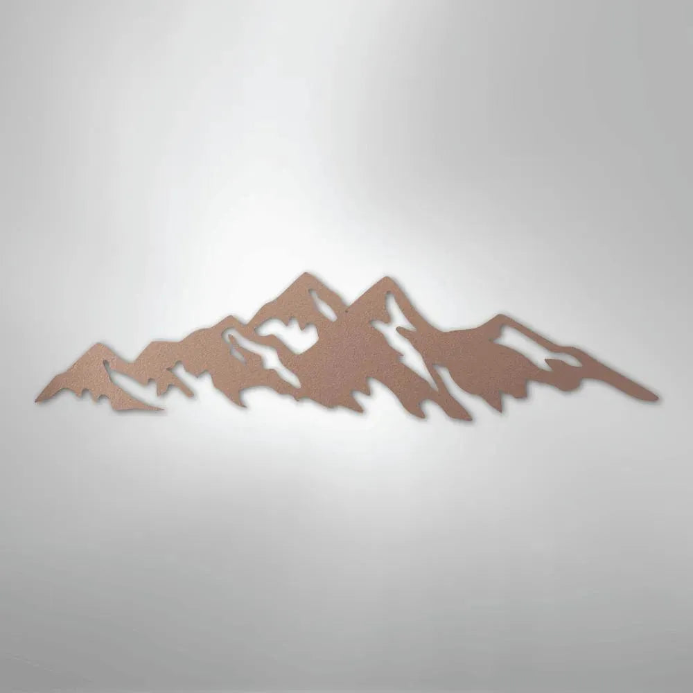 Copper-colored metal wall art depicting a jagged mountain range silhouette, suitable for indoor or outdoor display.
