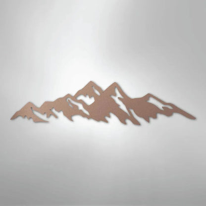 Copper-colored metal wall art depicting a jagged mountain range silhouette, suitable for indoor or outdoor display.