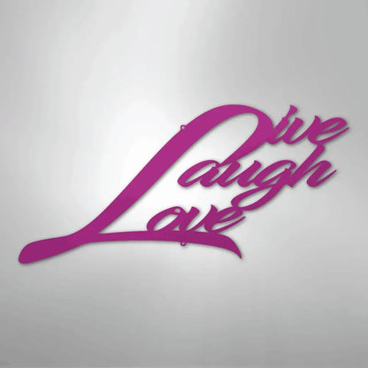 Pink "Live Laugh Love" metal wall art in a flowing script font, casting a subtle shadow.