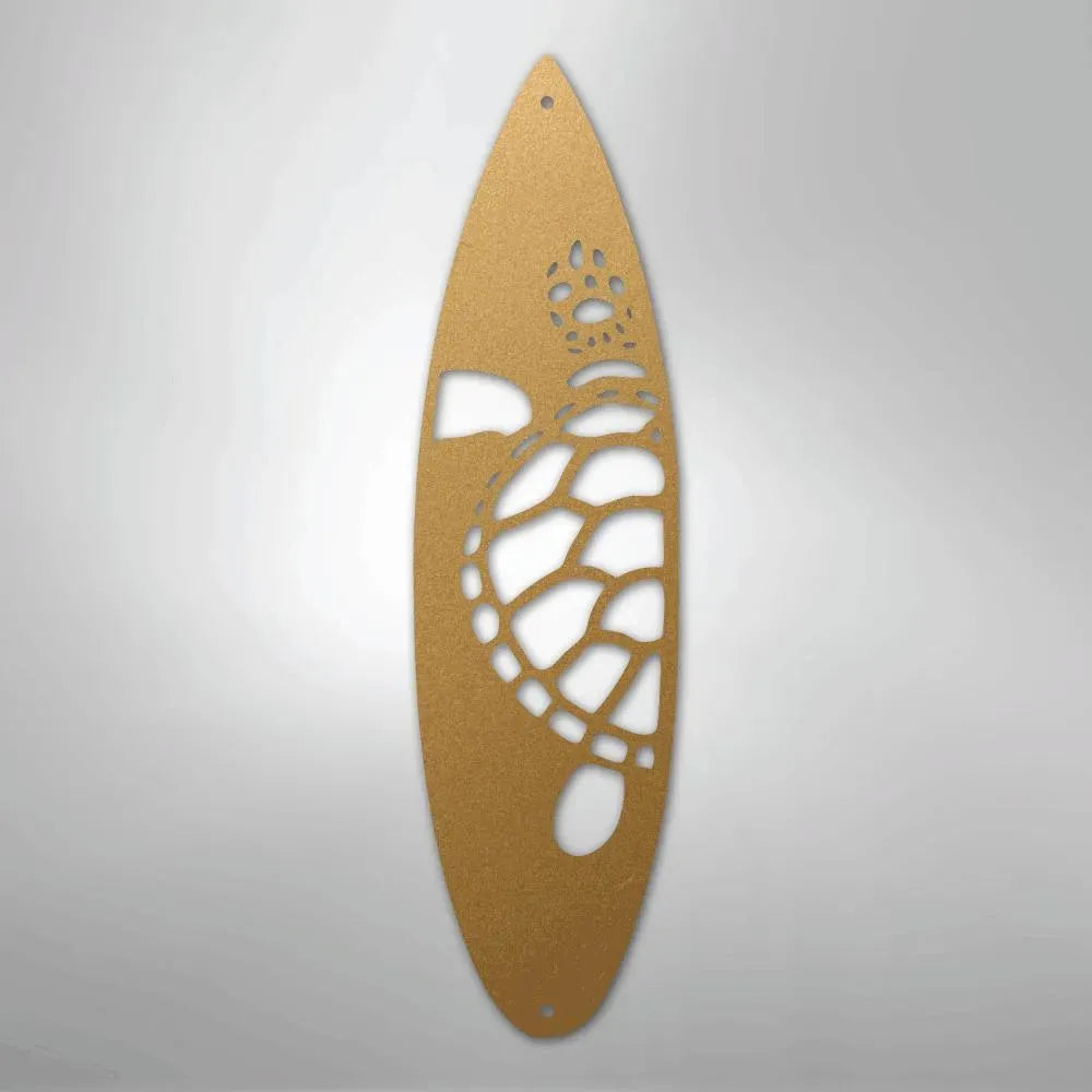 Bronze metal surfboard wall art with a cutout sea turtle design.