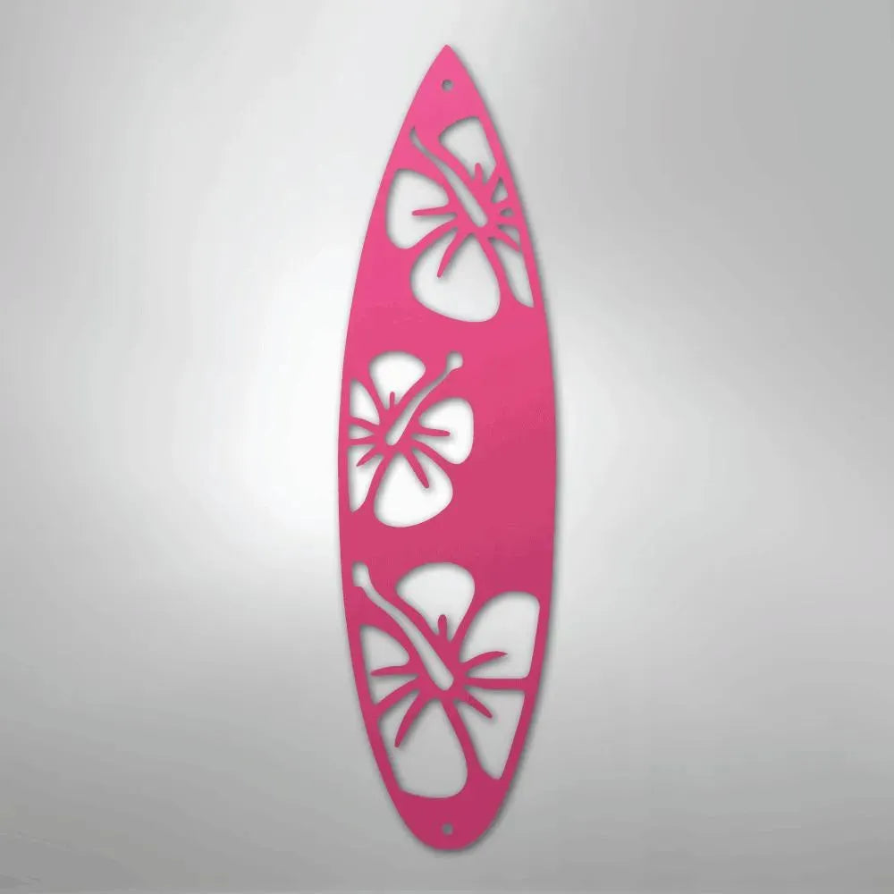 Pink metal surfboard wall art with hibiscus cutouts, ideal for indoor/outdoor decor.