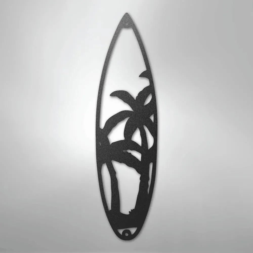 Black metal surfboard wall art with palm tree cutouts, ideal for indoor/outdoor surfer decor.
