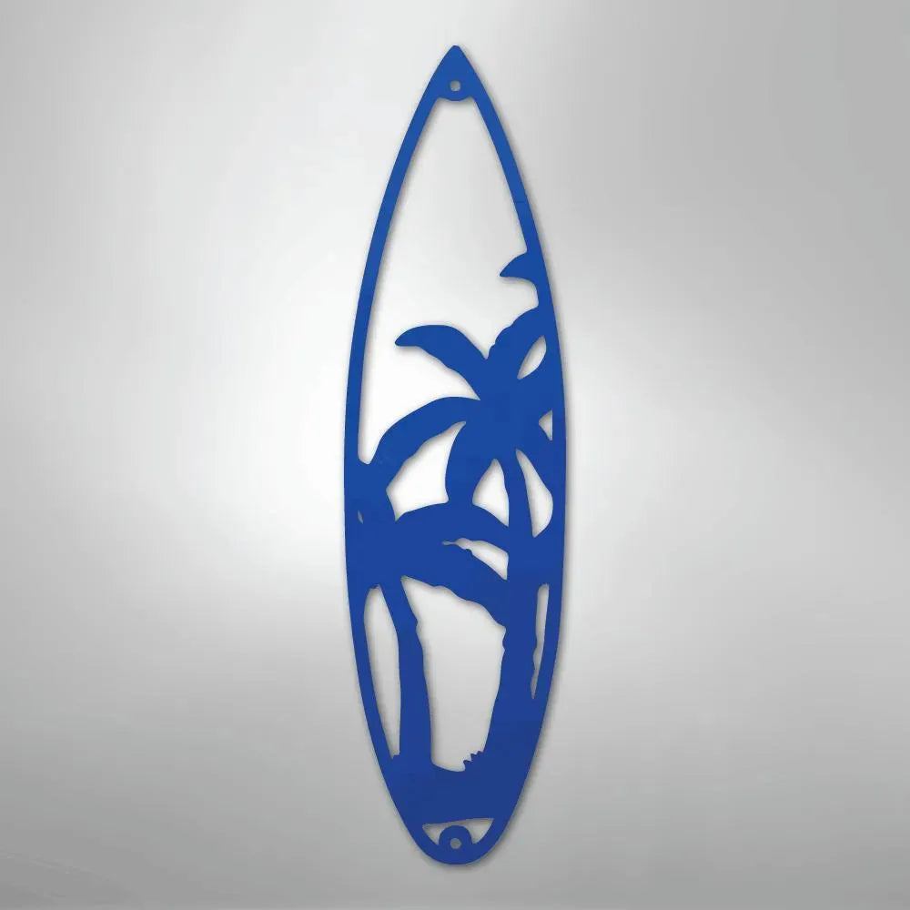 Blue metal surfboard wall art with palm tree cutout design.