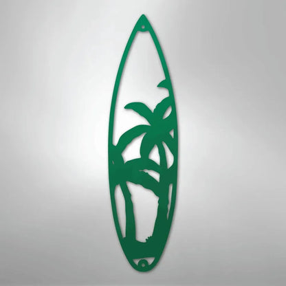 Green metal surfboard wall art with palm tree cutouts, powder-coated for indoor/outdoor decor.