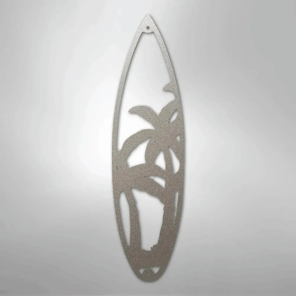 Silver metal surfboard wall art with palm tree cutout design, powder-coated for indoor/outdoor use.