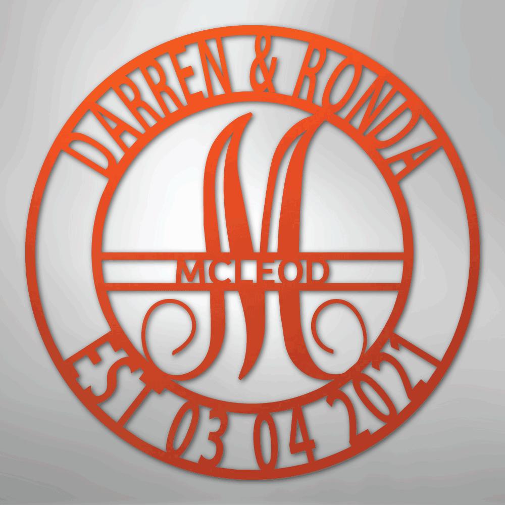 Orange metal family name wall art with "Darren & Ronda," a large "M," "McLeod," and "Est. 03 04 2021" in a circular design.