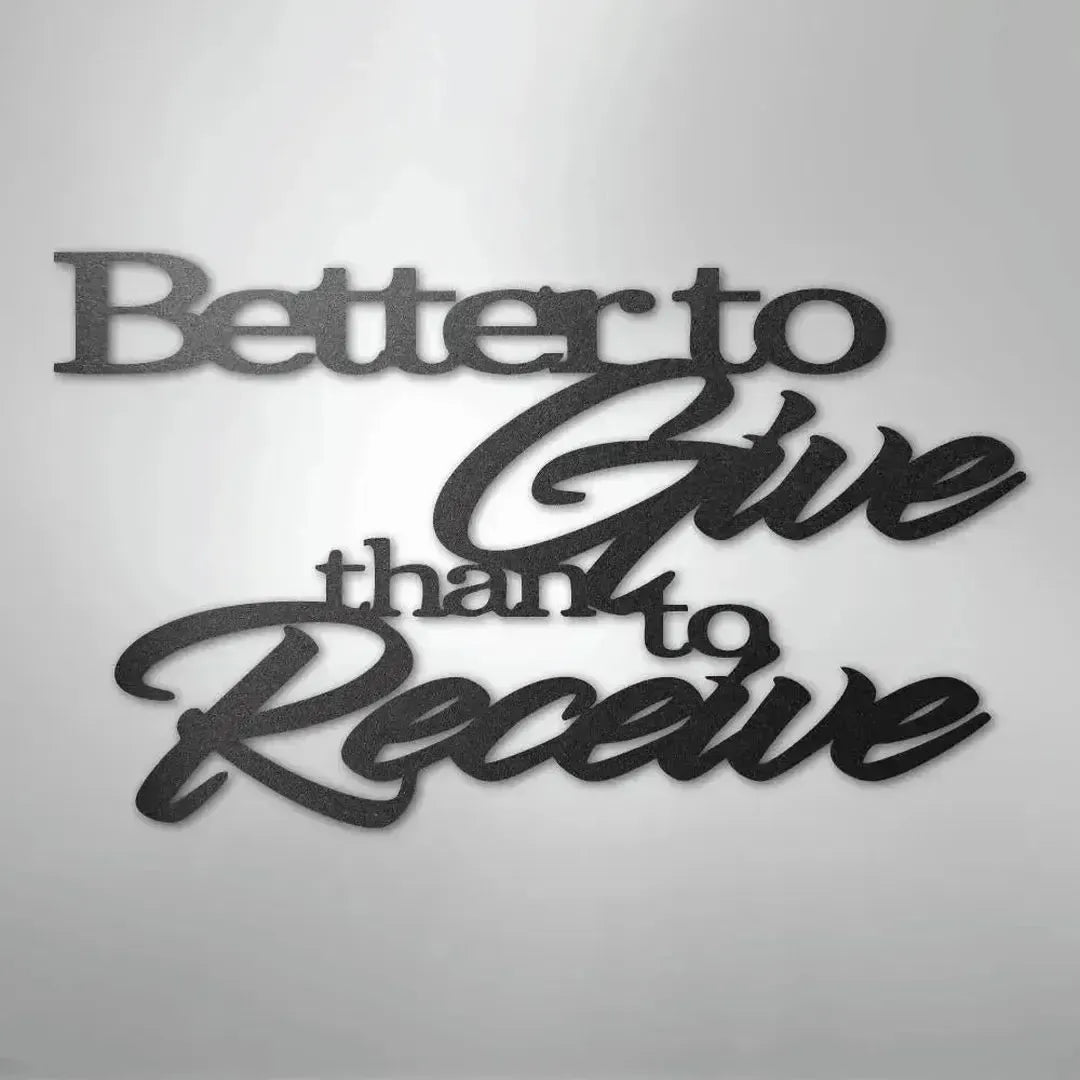 Black metal wall art with "Better to Give than to Receive" in elegant script and block fonts.