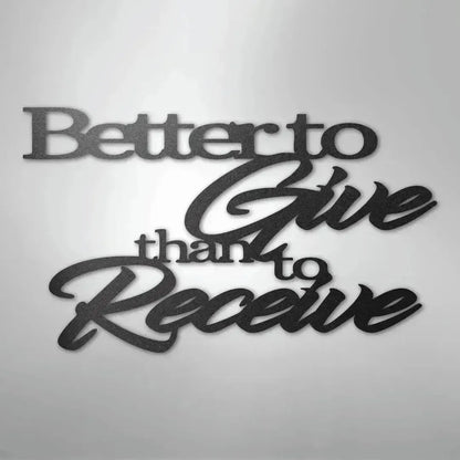 Black metal wall art with "Better to Give than to Receive" in elegant script and block fonts.