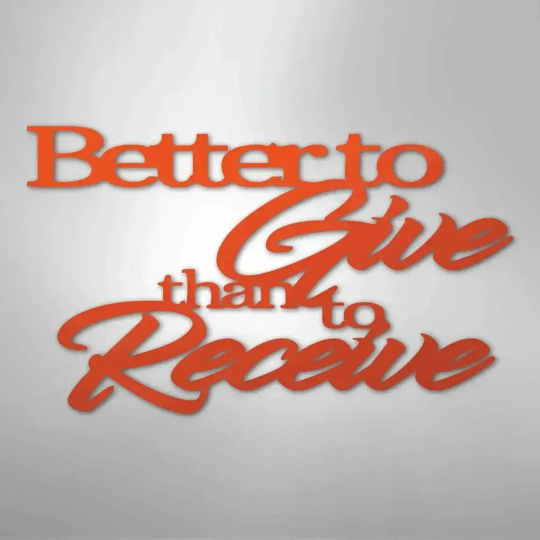 Orange metal wall art with "Better to Give than to Receive" in script and block fonts.