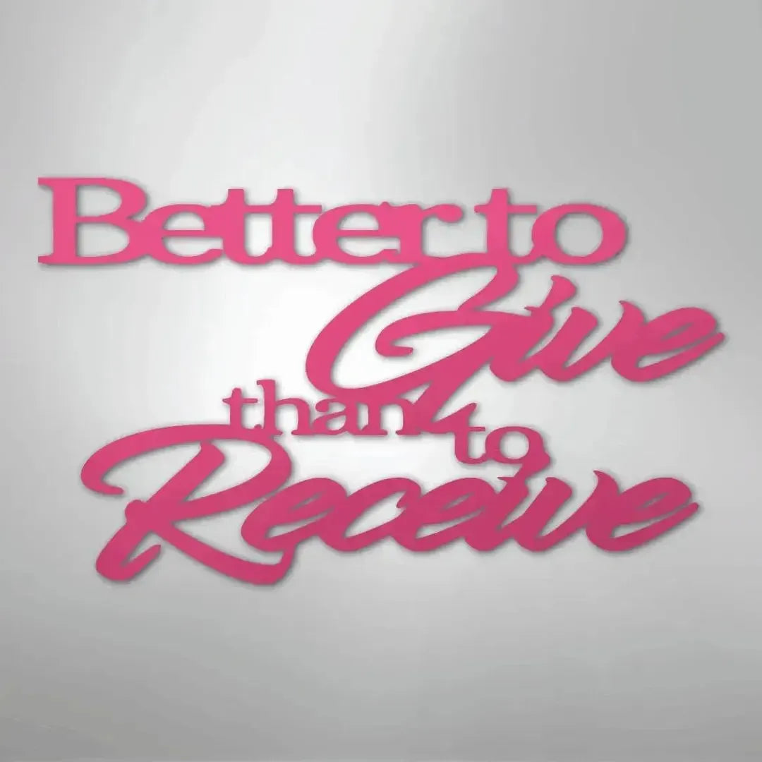 Pink powder-coated steel wall decor with "Better to Give than to Receive" in elegant script and block fonts.