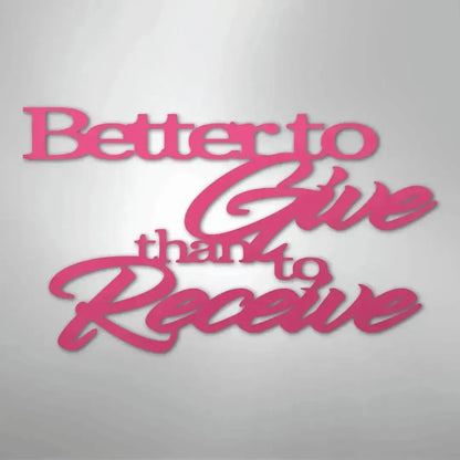 Pink powder-coated steel wall decor with "Better to Give than to Receive" in elegant script and block fonts.