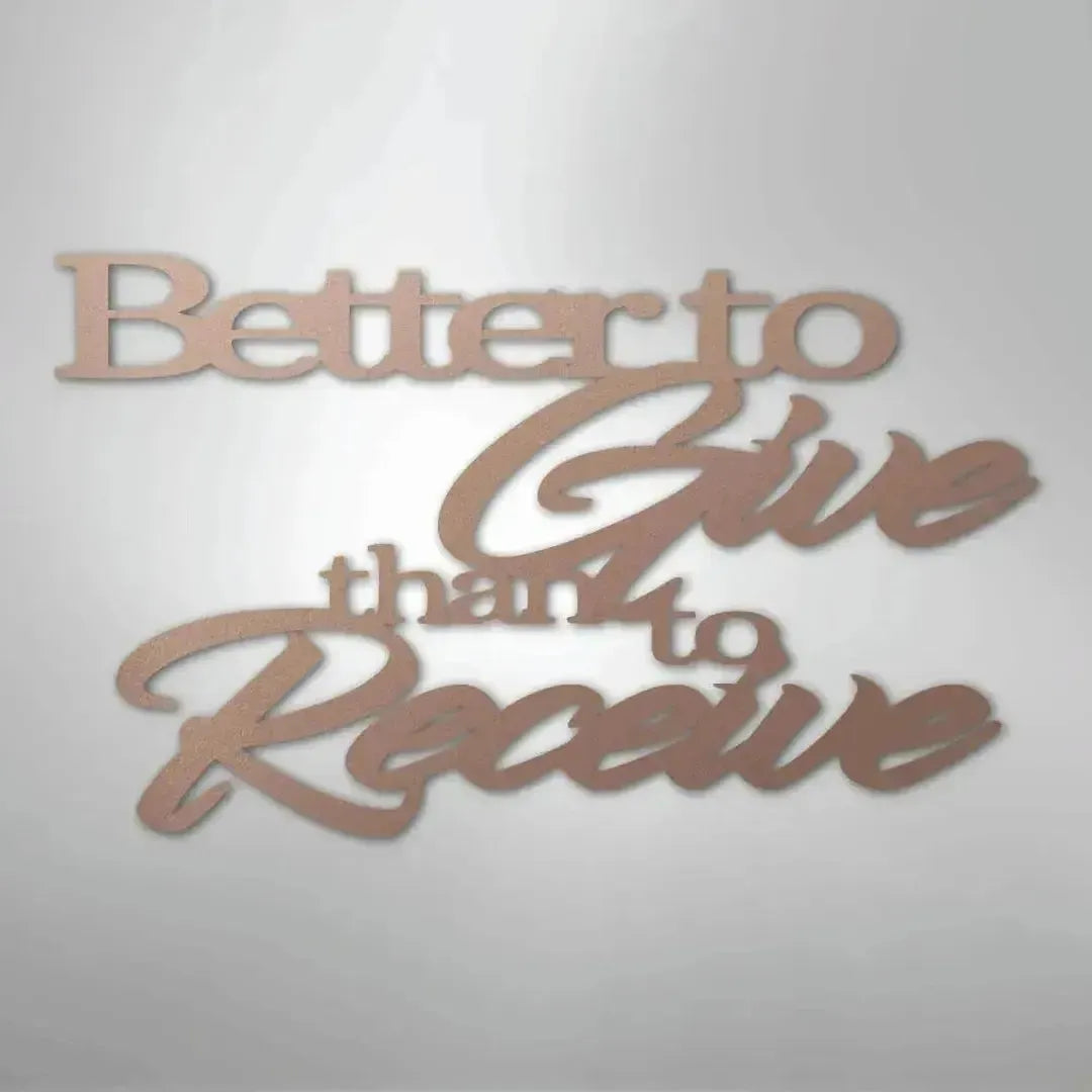 Rose gold metal wall art with "Better to Give than to Receive" quote in elegant script.