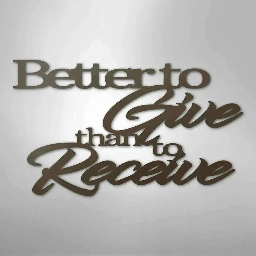Brown metal wall art with "Better to Give than to Receive" in elegant script and block fonts.