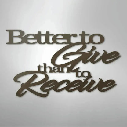 Brown metal wall art with "Better to Give than to Receive" in elegant script and block fonts.
