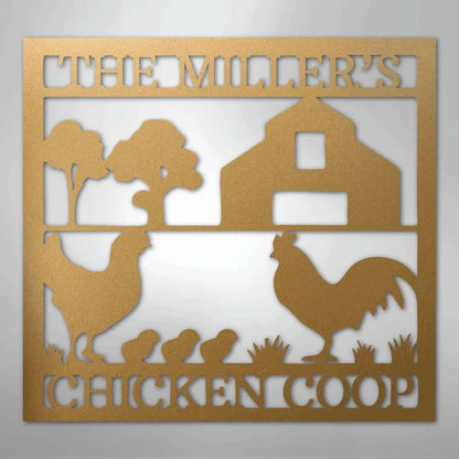 Gold metal chicken coop monogram wall art with a barn, rooster, hen, chicks, and trees.