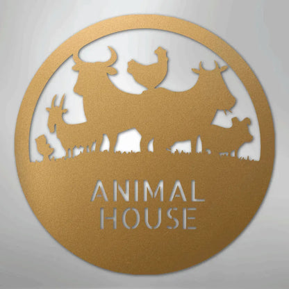 Gold powder-coated steel "Animal House" monogram with farm animal silhouettes: cow, chicken, goat, and pig.