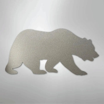 Silver metallic grizzly bear silhouette metal wall art, textured finish, walking pose.