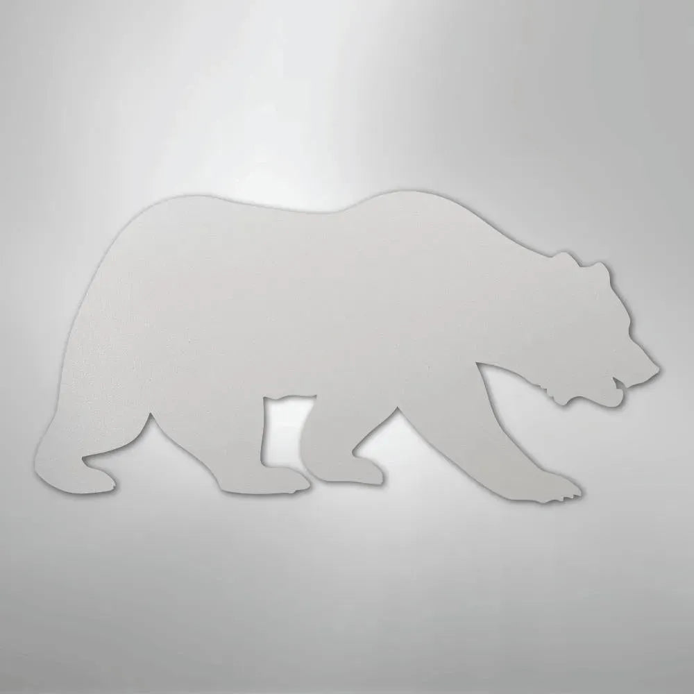 White metal grizzly bear silhouette wall art, walking left.