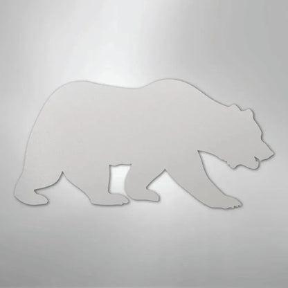 White metal grizzly bear silhouette wall art, walking left.