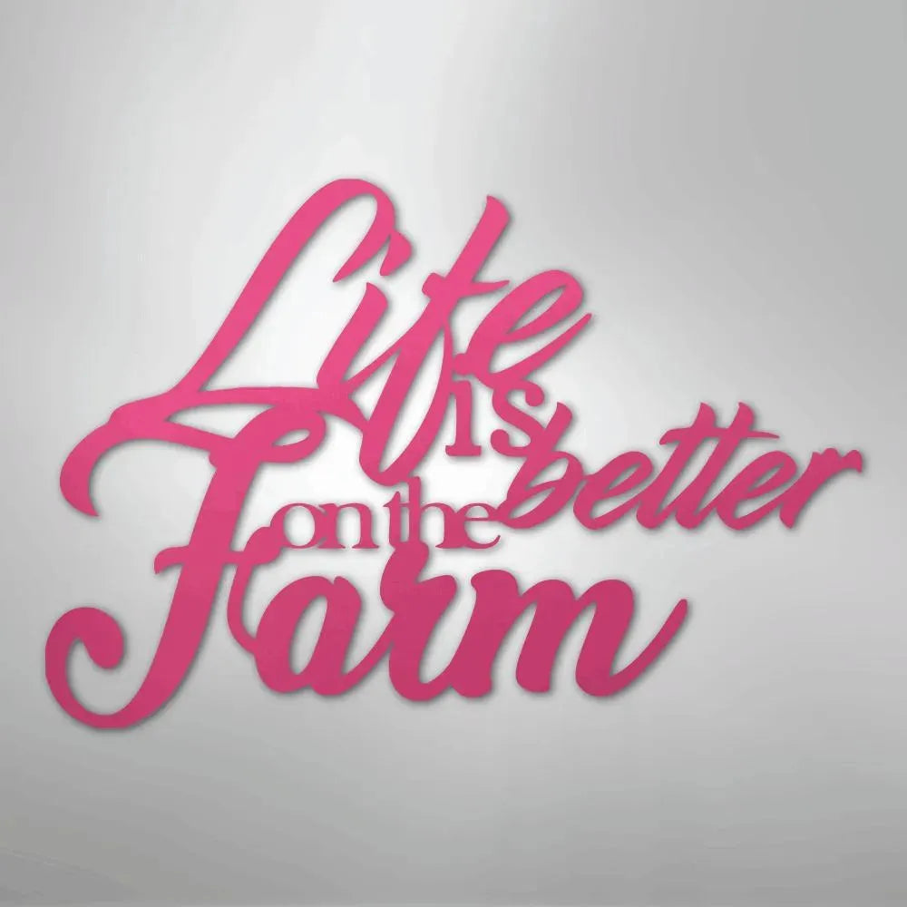 Pink powder-coated steel "Life is better on the Farm" quote wall art in a cursive font.