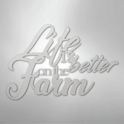 White powder-coated steel wall decor with "Life is better on the Farm" in elegant script.
