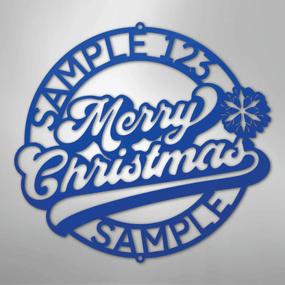 Blue metal Christmas ring wall art with "Merry Christmas" script and snowflake.