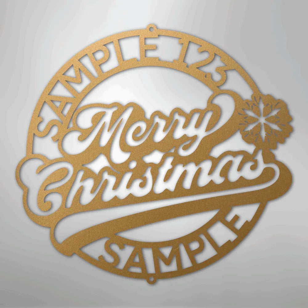 Gold metal Christmas ring wall art with "Merry Christmas" script and snowflake design.