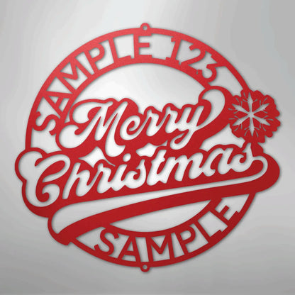 Red metal Christmas ring wall art with "Merry Christmas" script and snowflake design.